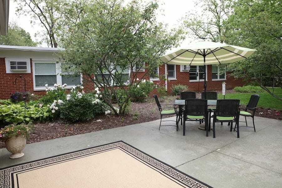 Sunset Patio Green Furniture And Umbrella