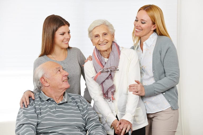 Home nursing for senior citizen couple with caregiver at home
