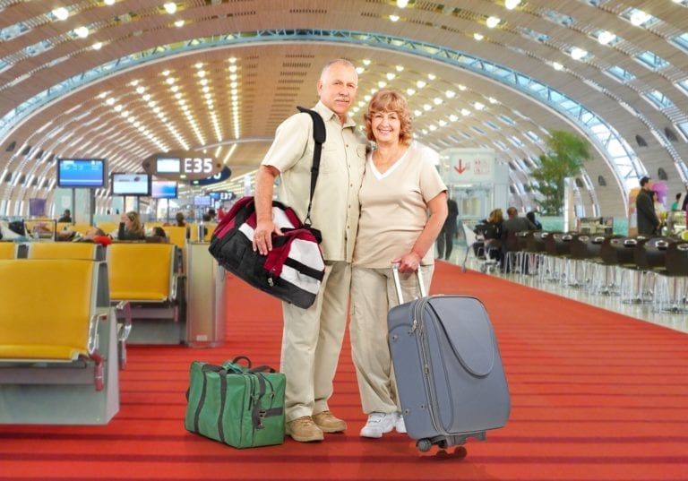 senior couple with diabetes traveling successfully