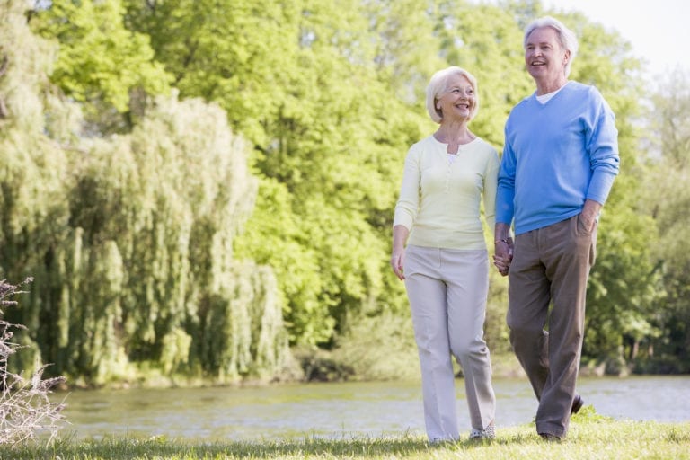 Senior couple enjoying a walk as part of a healthy lifestyle