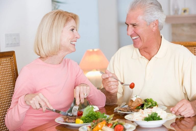 Elderly couple eating healthy